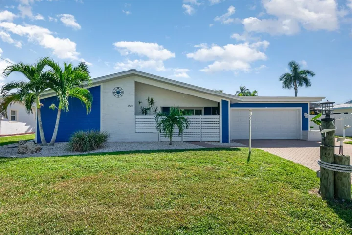 Traditional Florida-style home on the outside; elegantly updated home on the inside.