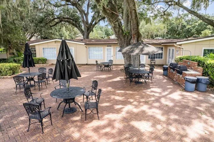Grills and tables behind the Clubhouse