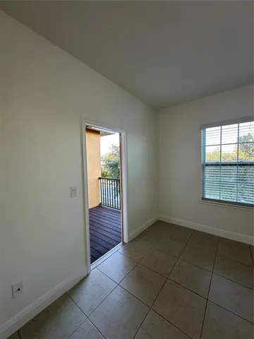 Master Bedroom w/access to balcony.