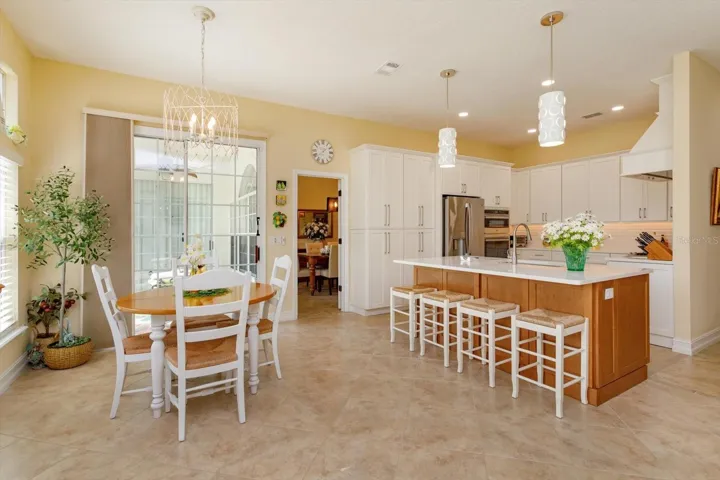 Bright and beautiful.  Updated kitchen opens to breakfast space.