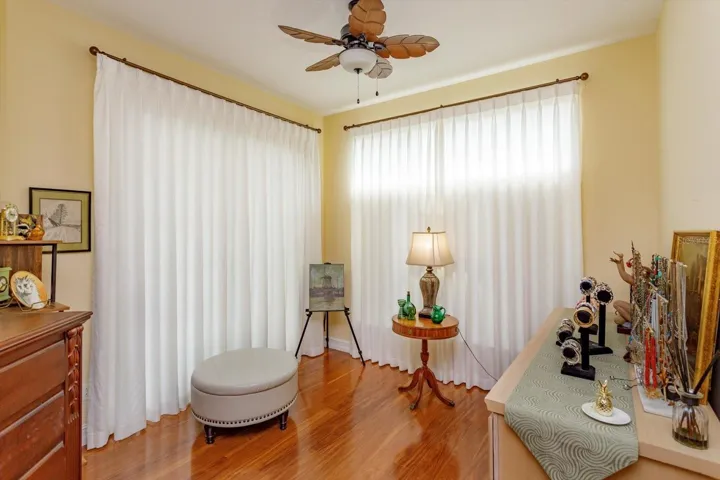 The primary bedroom includes space for workout/office or reading room.