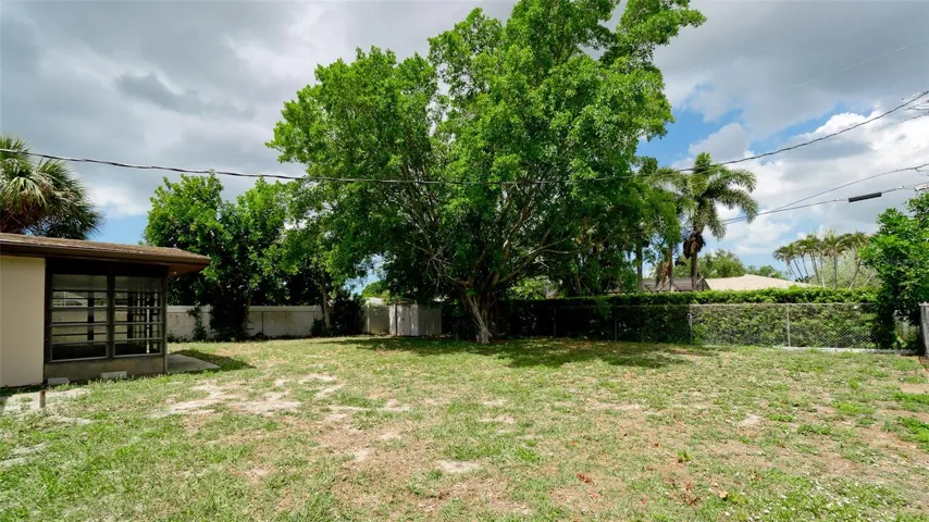 Large Backyard with room for an Inground Pool, Firepit/Entertainment Area, RV parking, and more
