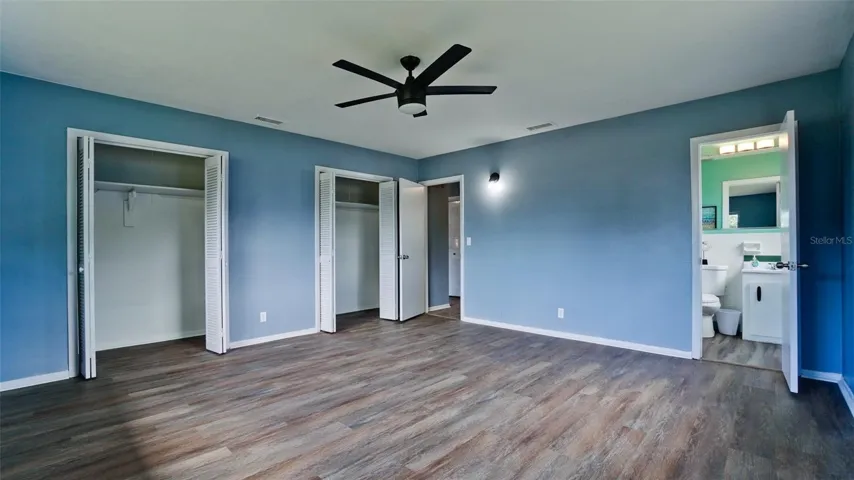 Primary Bedroom with Two Large Built-In Closets and EnSuite Bath