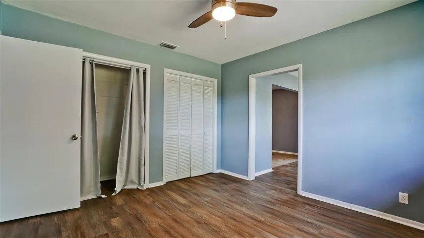 Guest Bedroom One with Built-In Closets