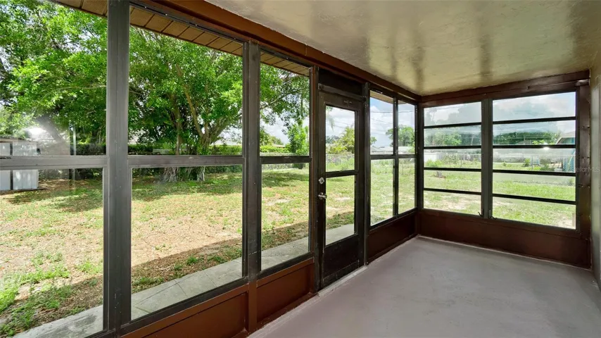 Back Porch with Louvered Glass Windows