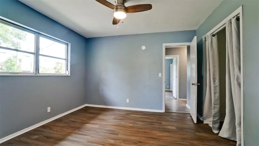 Guest Bedroom One with Built-In Closets