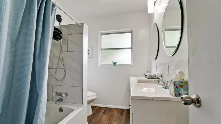 Guest Bath with Shower/Tub combination and Double Vanity