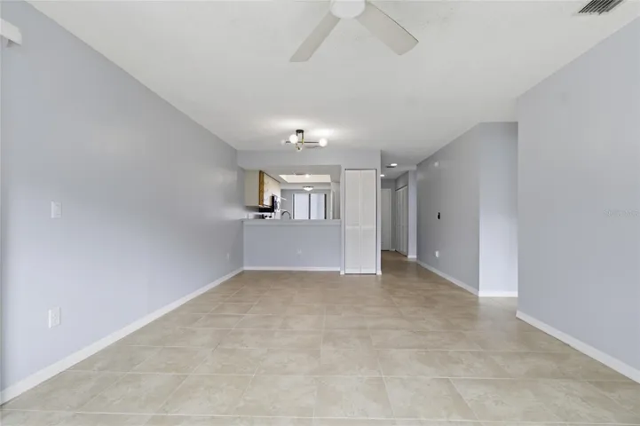 Living Room dining rm combo w/sliders to lanai