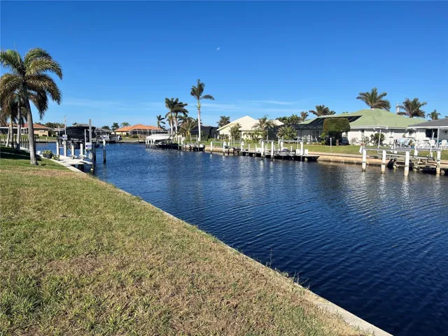 Beautiful water view iwith well maintained homes around this lot.