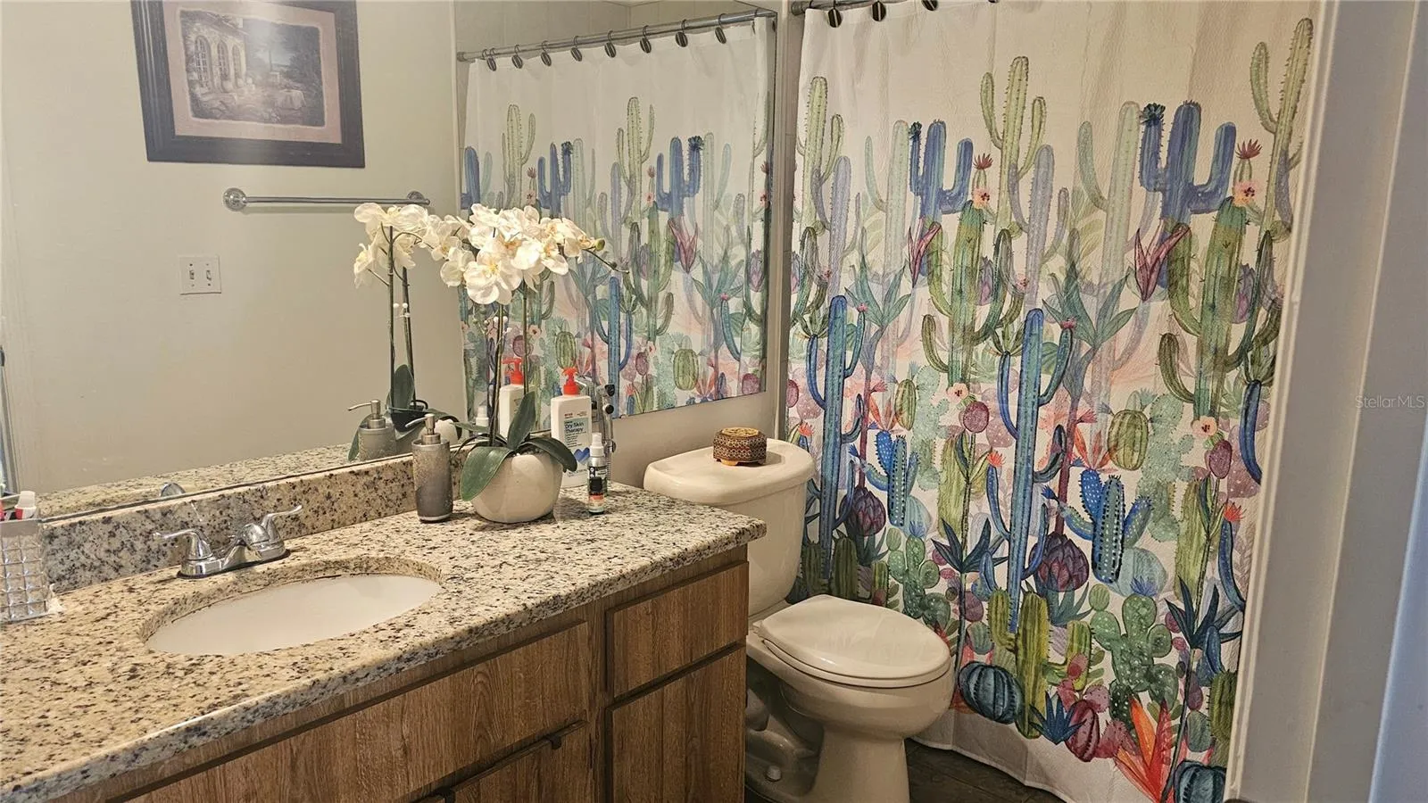 Guest Bathroom with granite and shower and tub