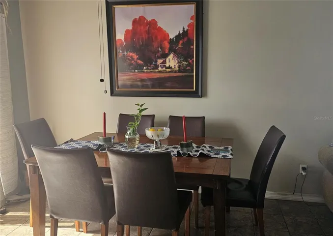 Dining area with backyard view