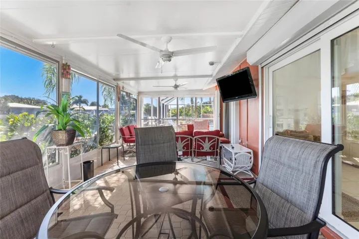 TV on lanai and eating area