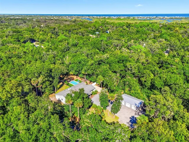 This private residence is on almost 1.5 acres and just minutes from the beach.