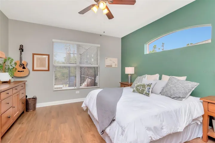 Primary Bedroom windows overlooking pool