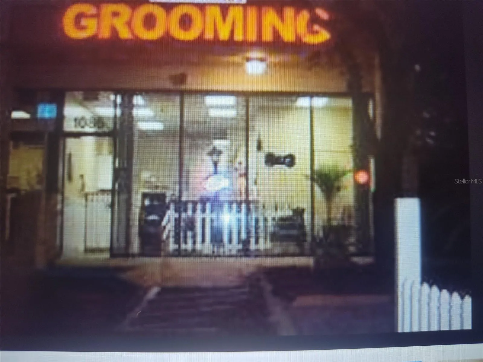 FRONT W LIT SIGN