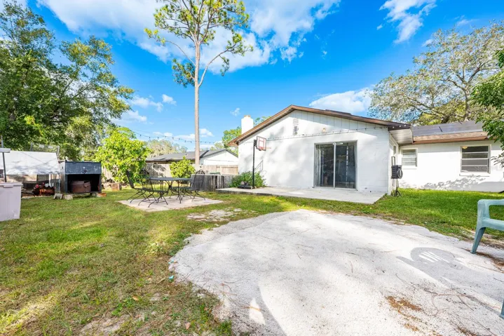 Fenced yard, multiple patio spaces.