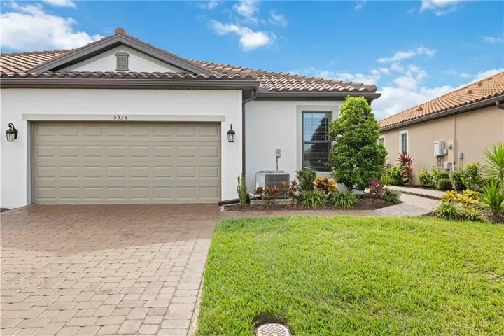 Front of Home with sealed driveway