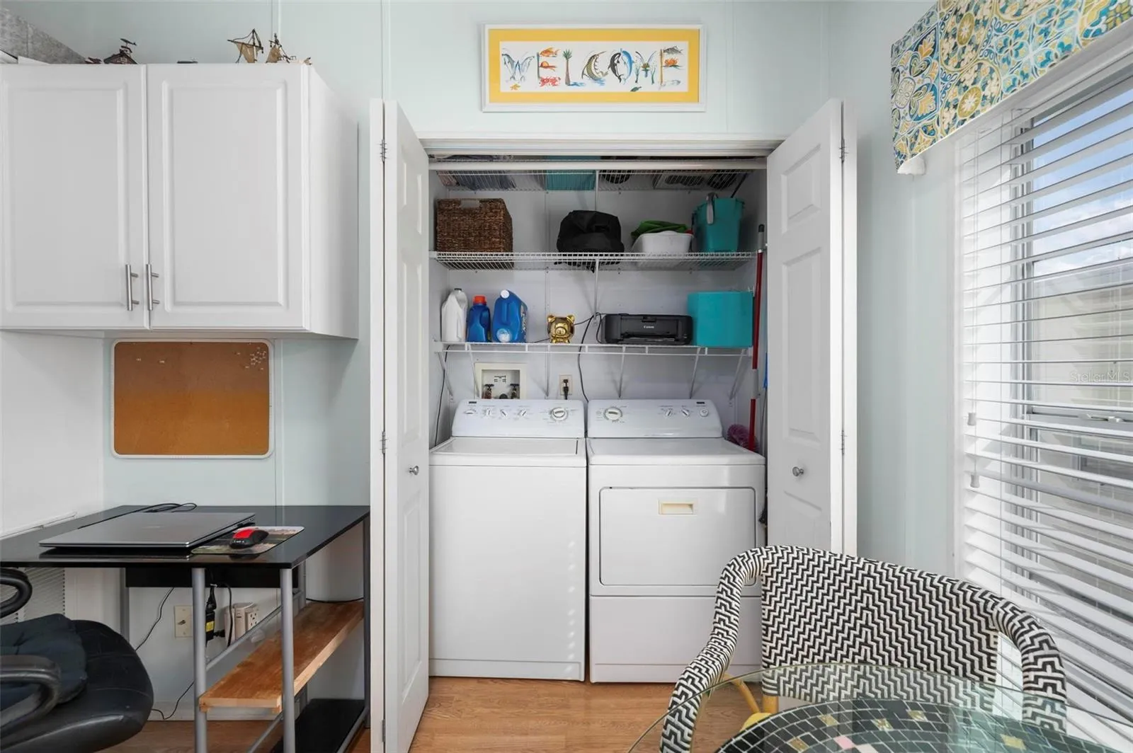 Laundry space off of kitchen