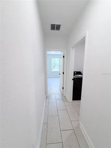 Bedroom 4 door/laundry/hallway