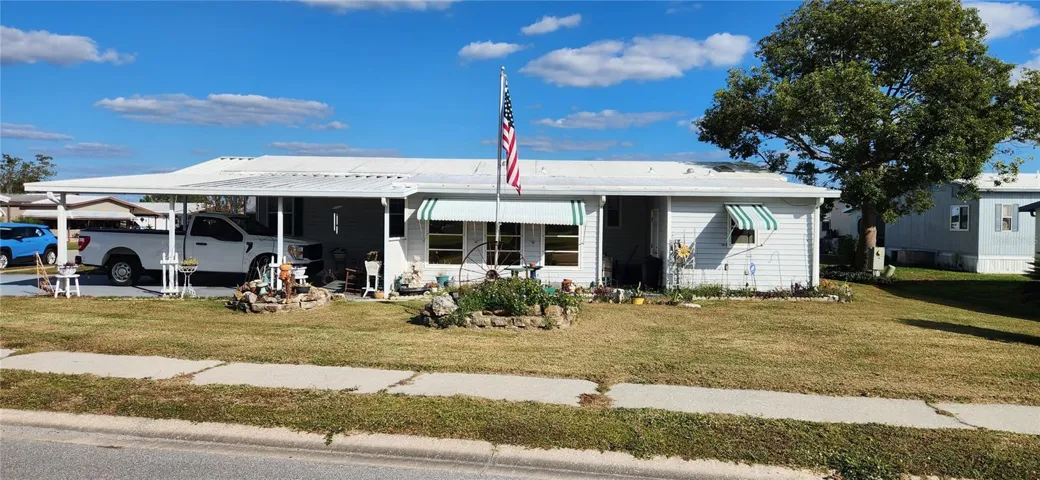 Front  with flower gardens