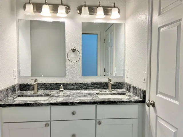 Dual-Vanity with Granite Countertops