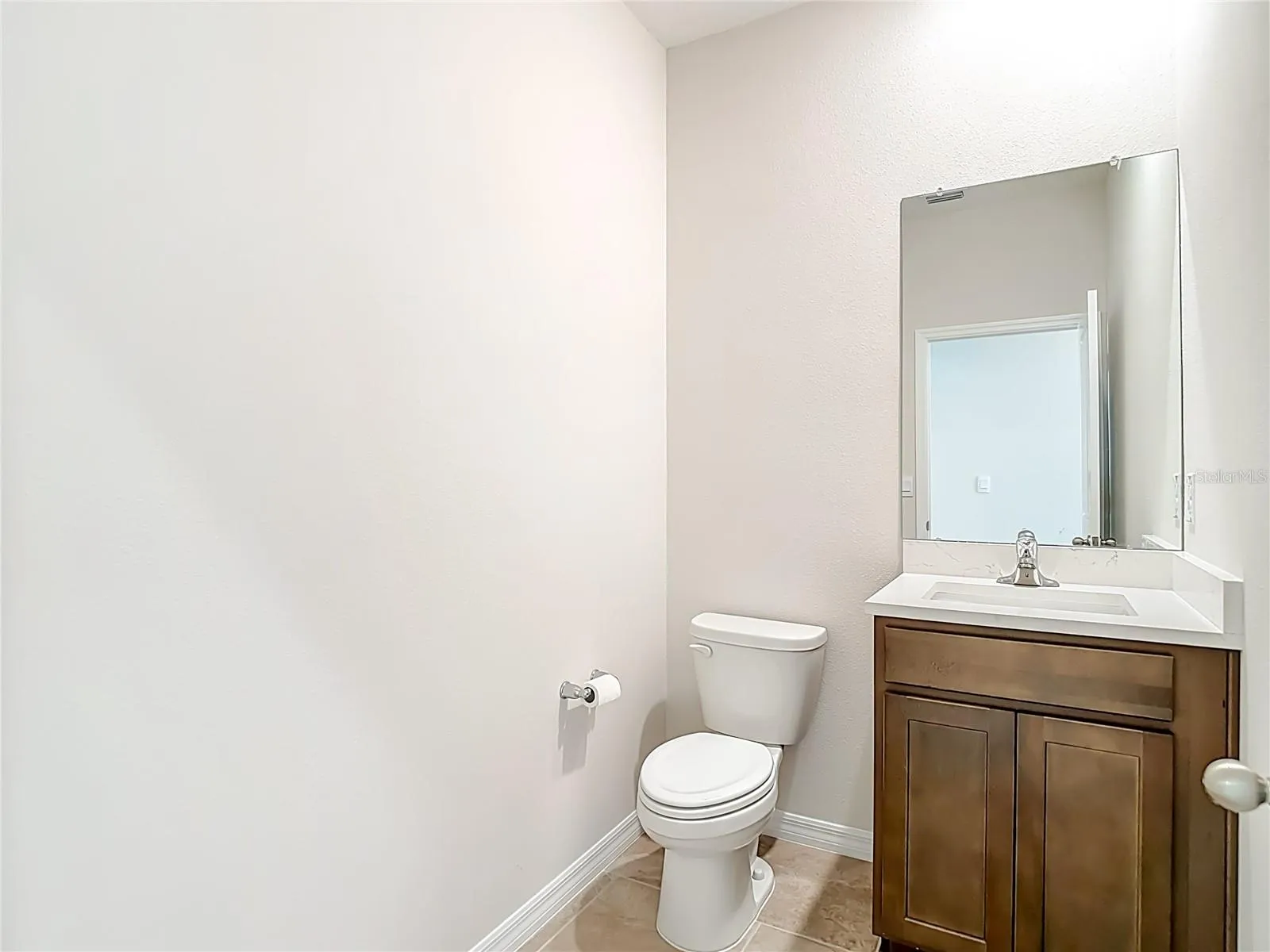 Half bathroom by garage!