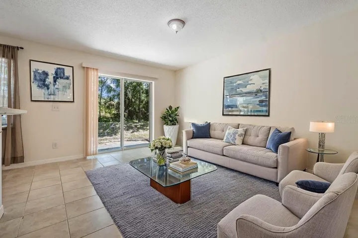 Sliding Door to outside. This photo has been Virtually Staged.