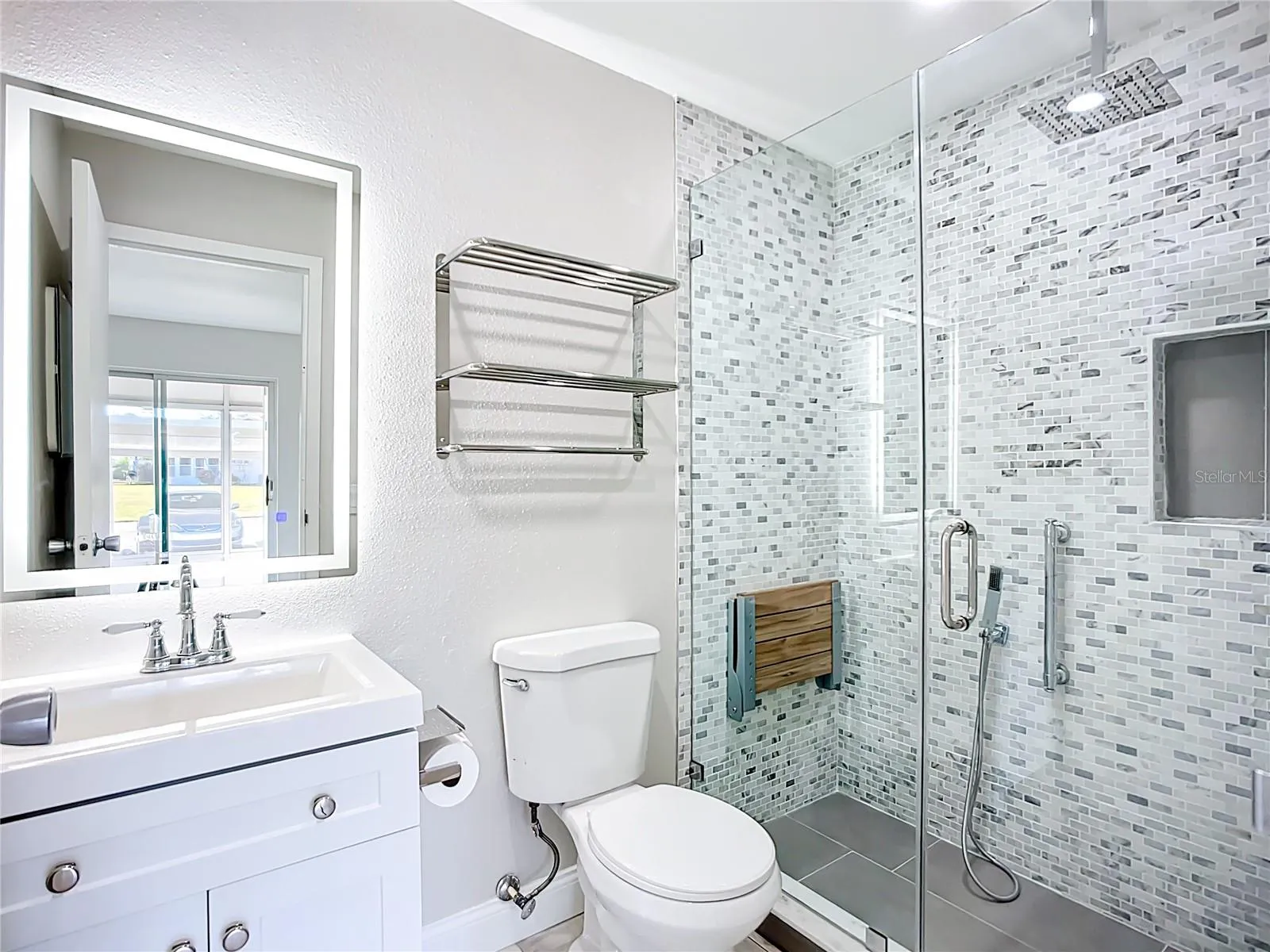 Awesome custom shower, LOOK CLOSELY there's a cell phone holder above the TP holder!