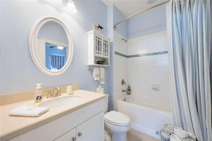 The second full bath is light and bright with a tub/shower combo.
