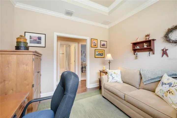 The den also features pocket doors for privacy.