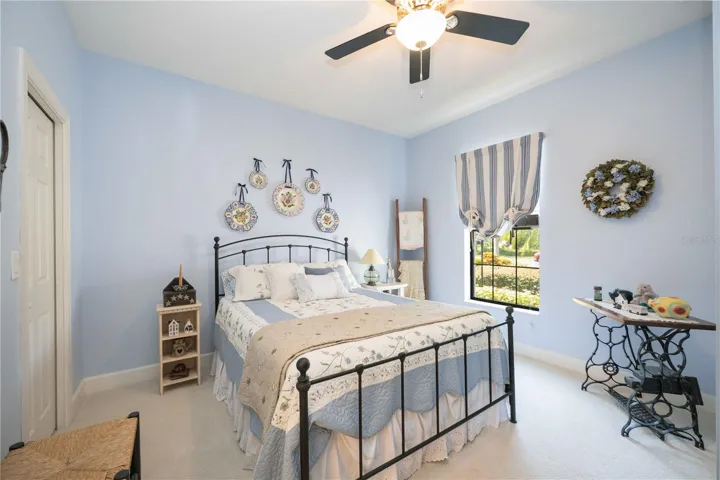 The second bedroom has it's own window and is styled in soothing light blues, creating a calm and welcoming retreat that will make any guest feel right at home.