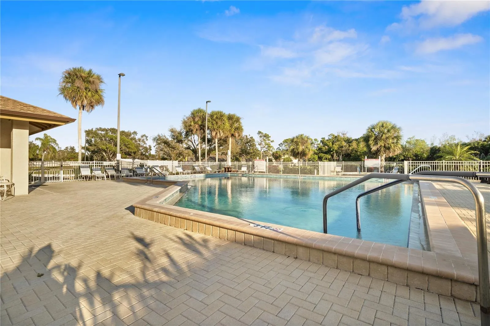 Pool has several seating areas that are shaded and several that are sunny depending on your mood!