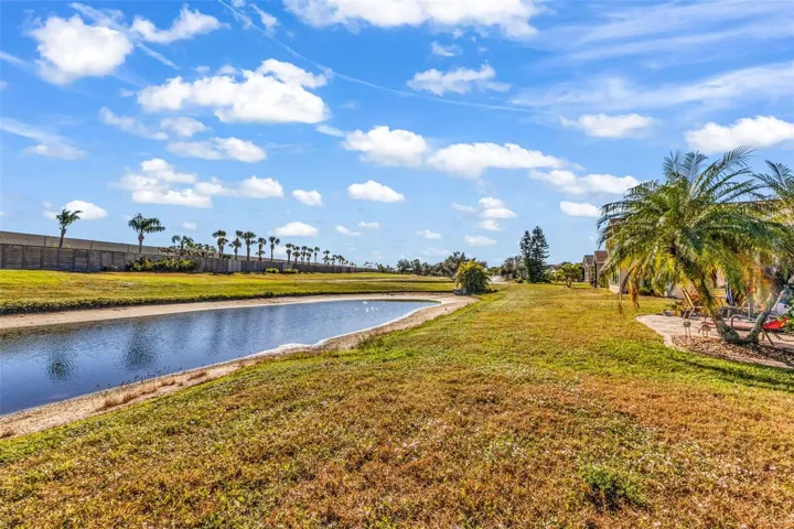 Backyard views with pond.