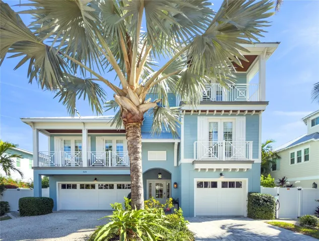 front of residence with 3 car garage
