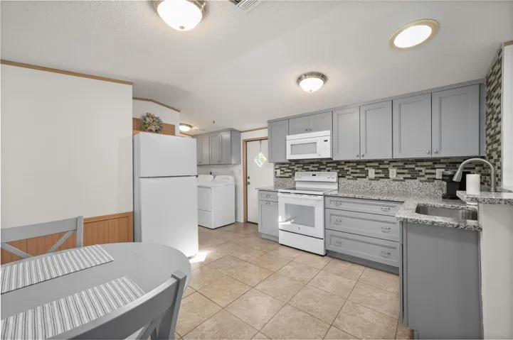 Remodeled Kitchen with Granite , new soft-close cabinets and appliances.