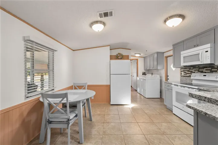 Remodeled Kitchen with Granite , new soft-close cabinets and appliances.