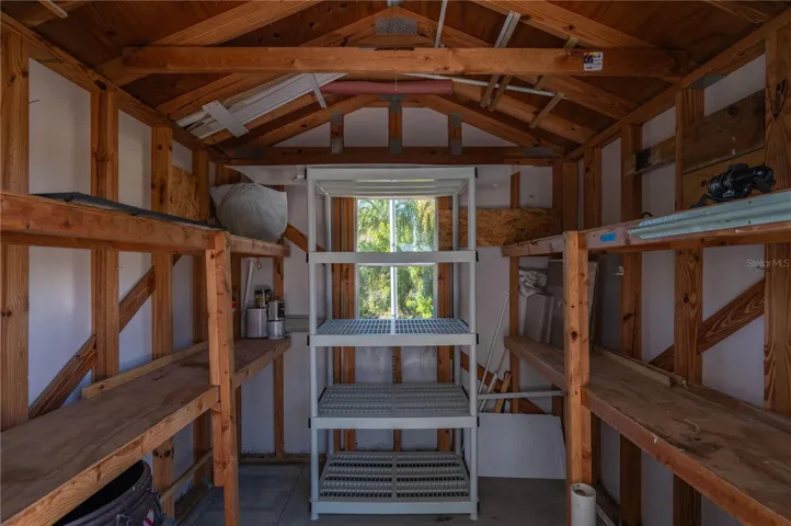 carport has a spacious shed at the end for your tools, fishing gear or the trash/recycle bins