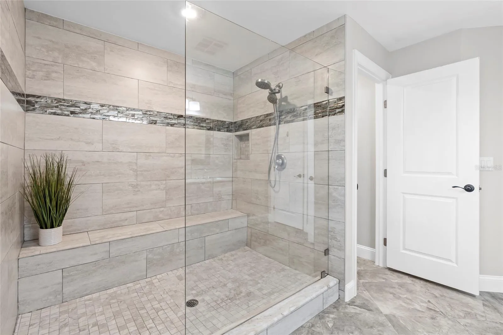 Primary bedroom with walk-in shower