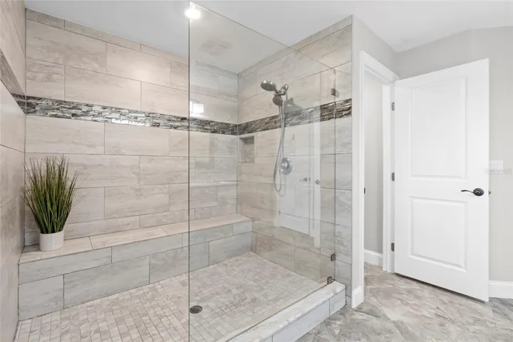 Primary bedroom with walk-in shower