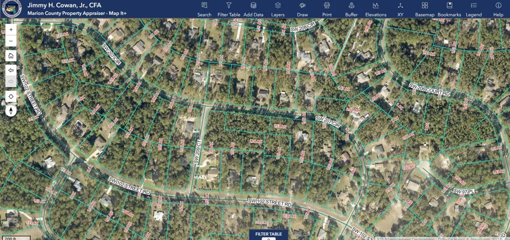 ZOOM OUT AERIAL OF THE WOODLAND