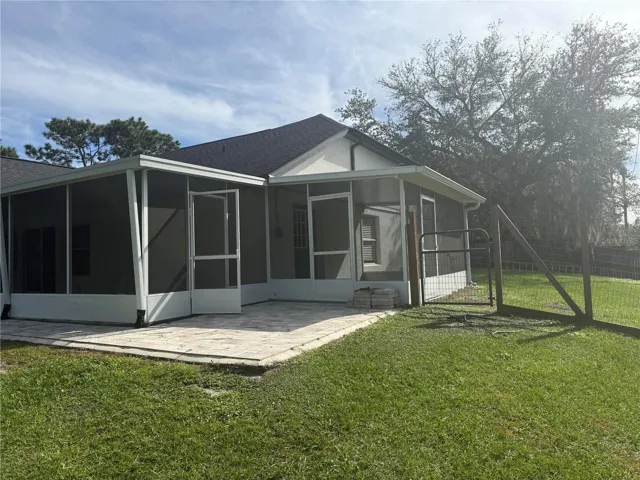Showing both patio from in law suite and Back patio from Family room