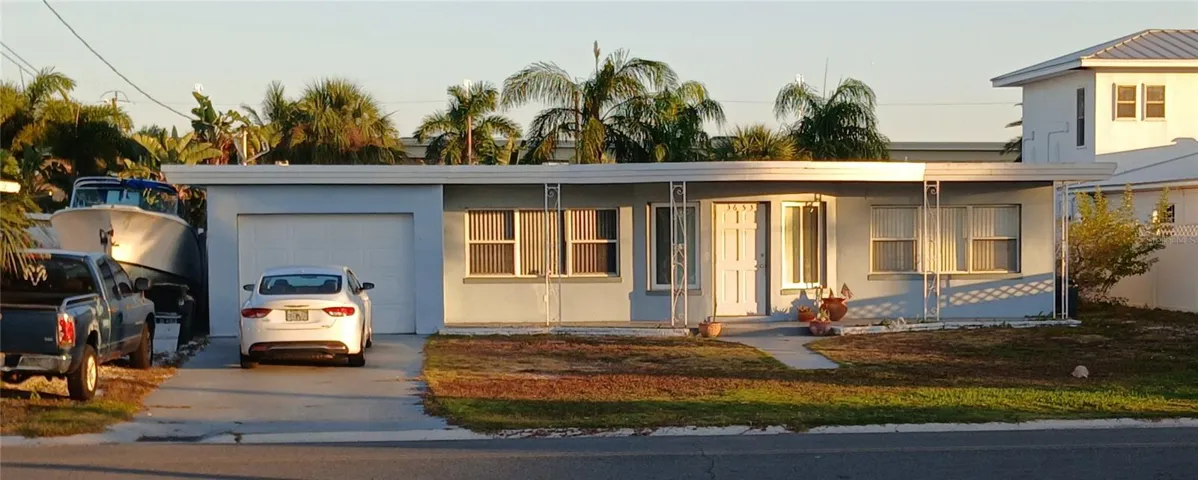 Front of the Home, area to park boat or RV to the left of the home.