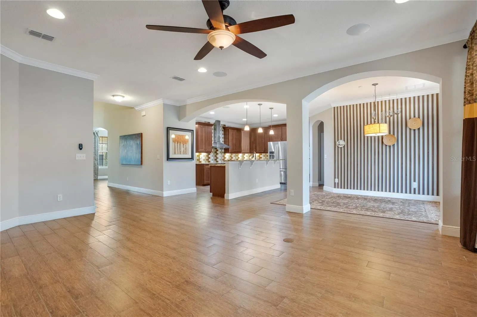 family room view to kitchen / dinette