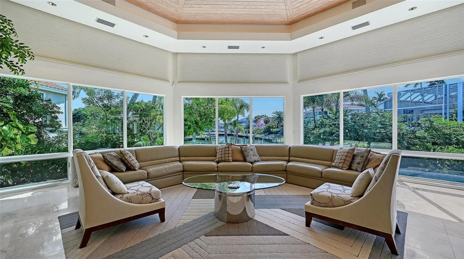 Immense Great room offering serene, open-water views of the canal.