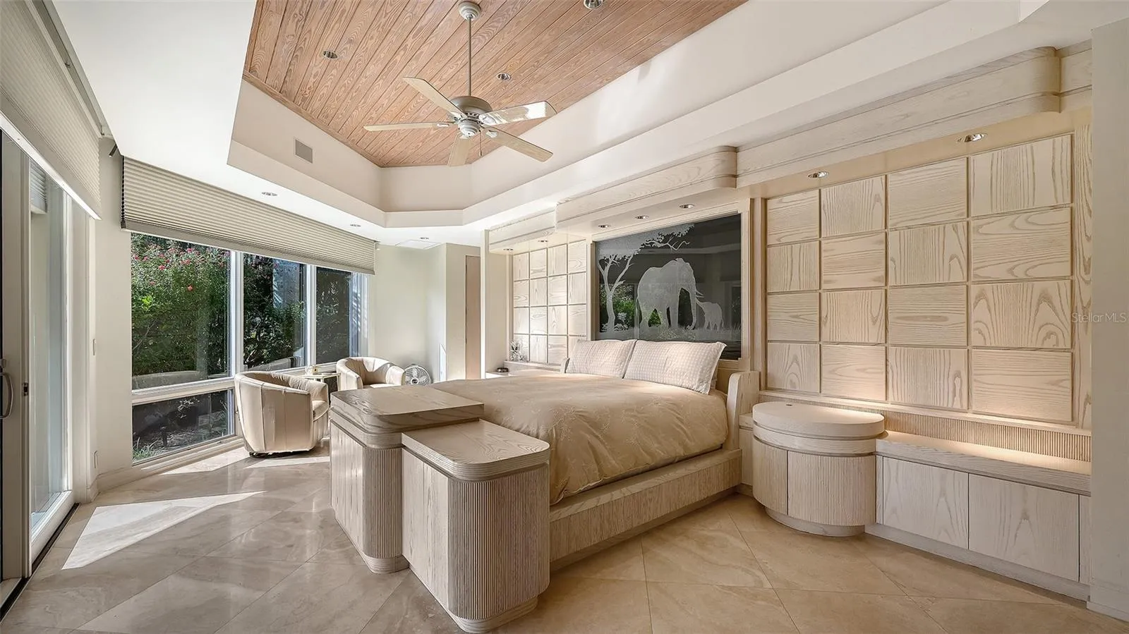 Unique circular primary bedroom with striking built-ins, offering both style and function