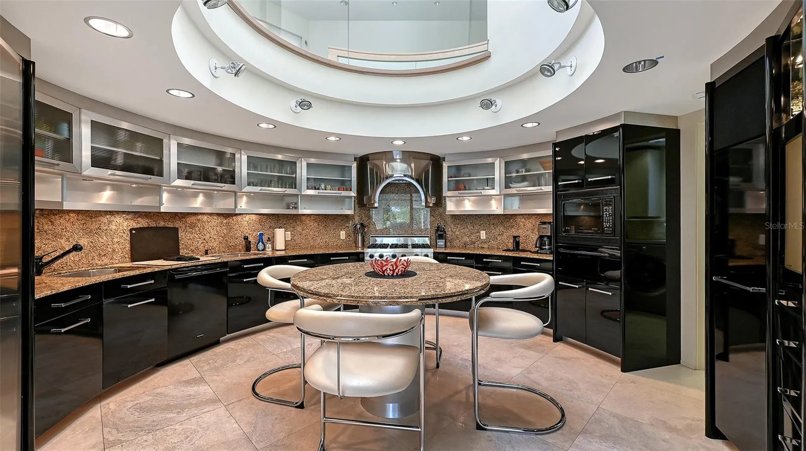 Two Story Circular Kitchen with upper skylight