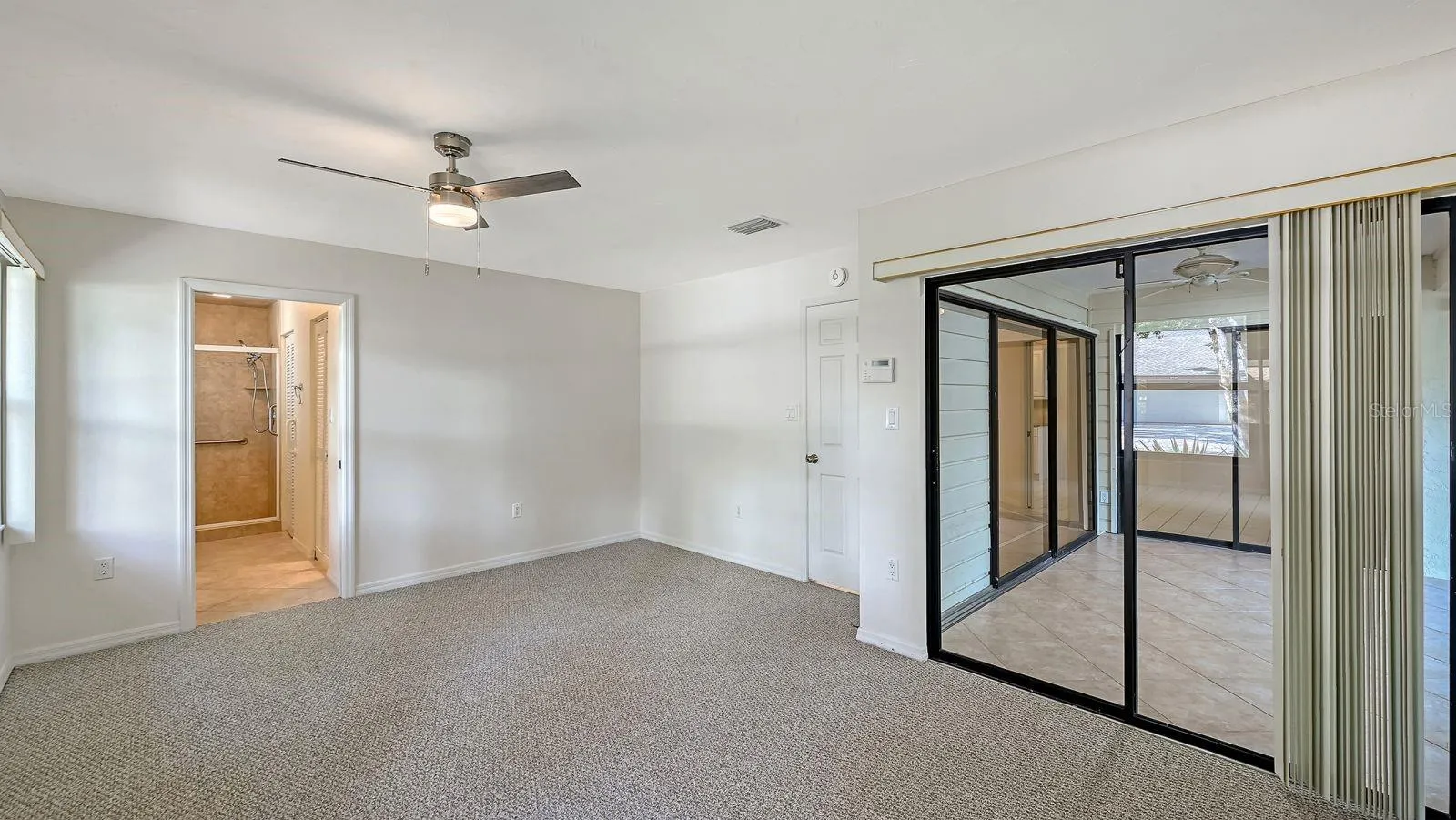 Primary Bedroom with access to the FL room