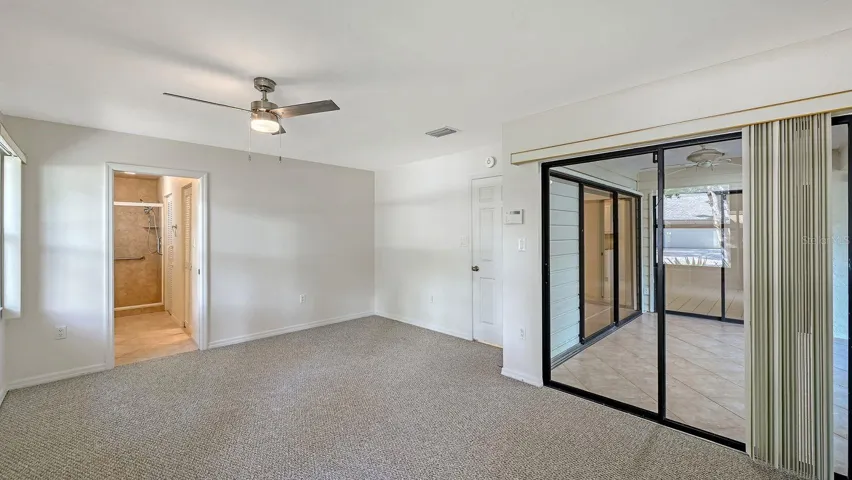 Primary Bedroom with access to the FL room