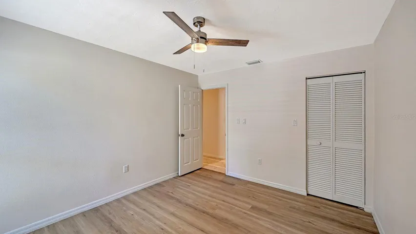 Brand new vinyl flooring in the Guest Bedroom