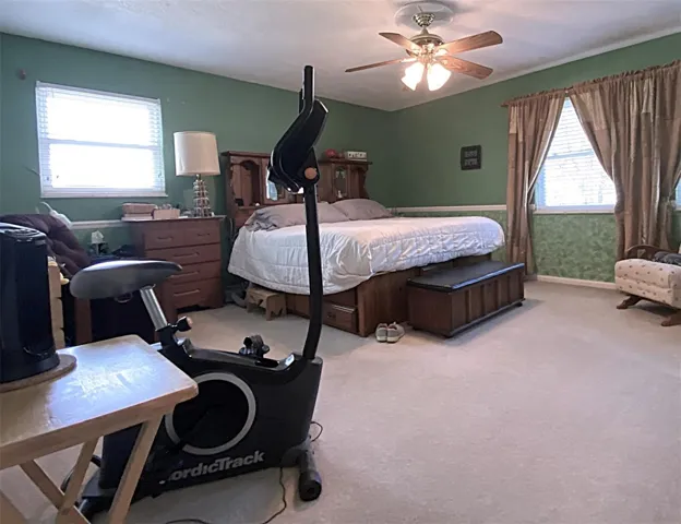 Master bedroom measures 15'x15', has double closets and private bath
